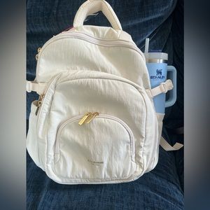isaac mizrahi backpack- cream w/ gold